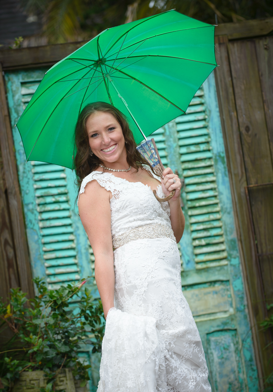bridal portrait with green umbrella