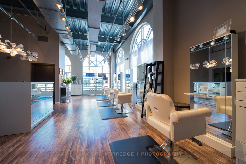 Commercial photography of the white furniture, hair salon at Dolce Lusso Spa in Myrtle Beach, SC
