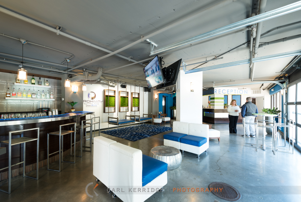 Lifestyle photography of the reception at Hotel Blue for e3 studios in Myrtle Beach, SC