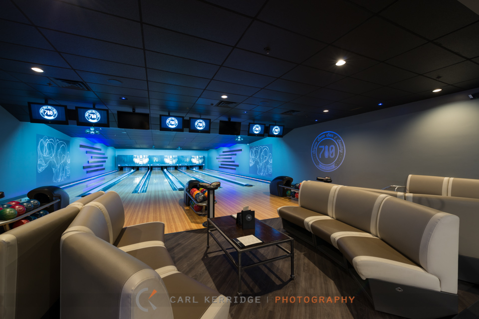 Commercial photography of the bowling lanes and furniture at 710 Bowling Alley, interior design by e3 studios