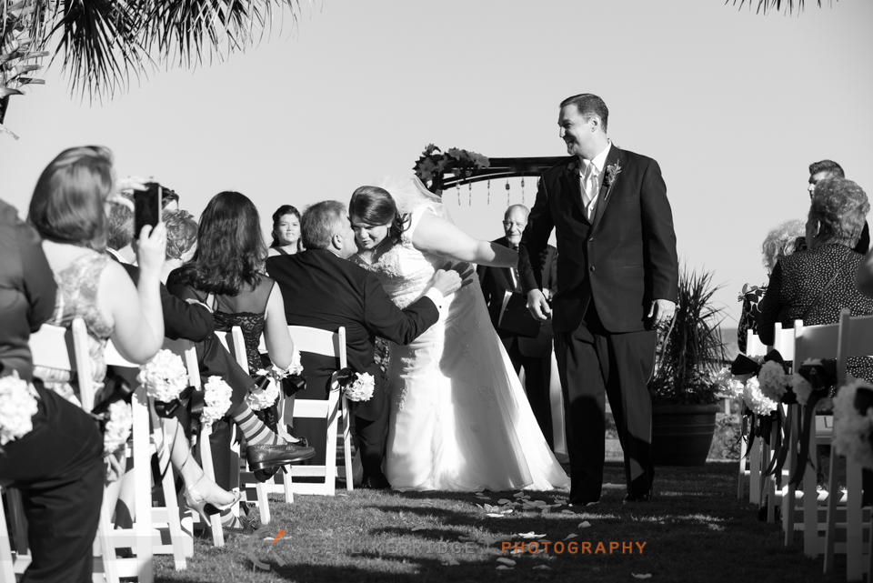 Myrtle Beach Wedding Photographer, Photojournalism, BW Wedding Image, Breakers Resort, Ceremony, Kiss Daddy