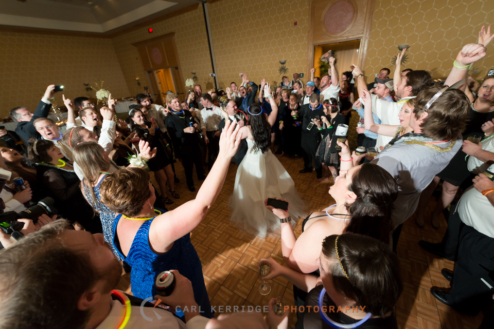 Wild crazy wide angle shot of wedding party on New Years Eve