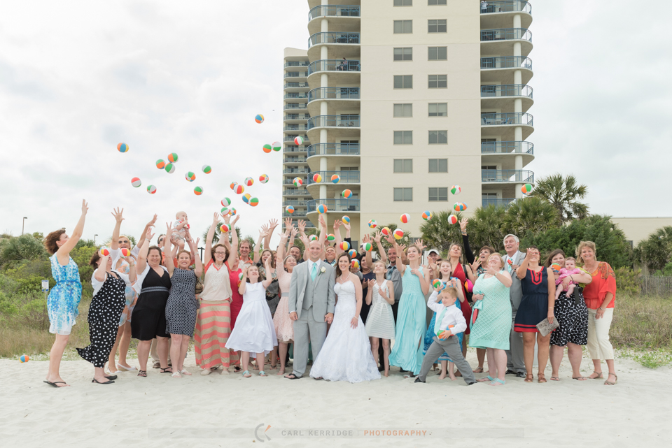 Wedding details, wedding party throwing beach balls in Myrtle Beach