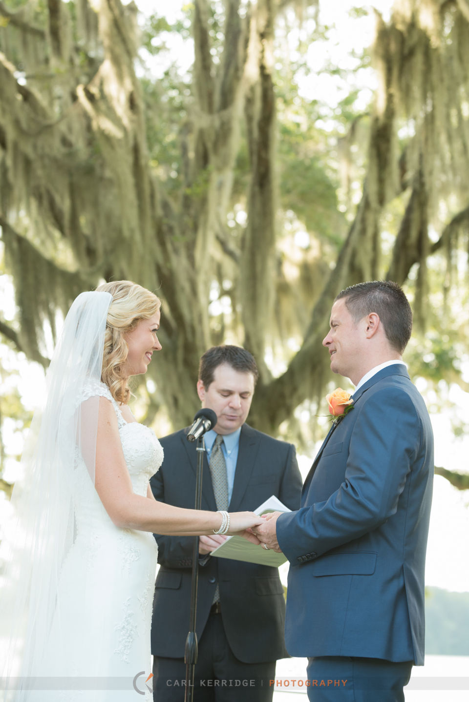 Bridal ceremony at Wachesaw Plantation under the live oaks and spanish moss