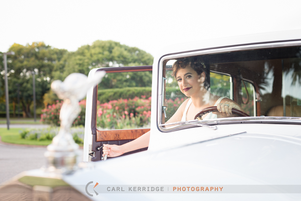 styled photo shoot with bridal portraits and a Rolls Royce at The Dunes Club in Myrtle Beach, South Carolina