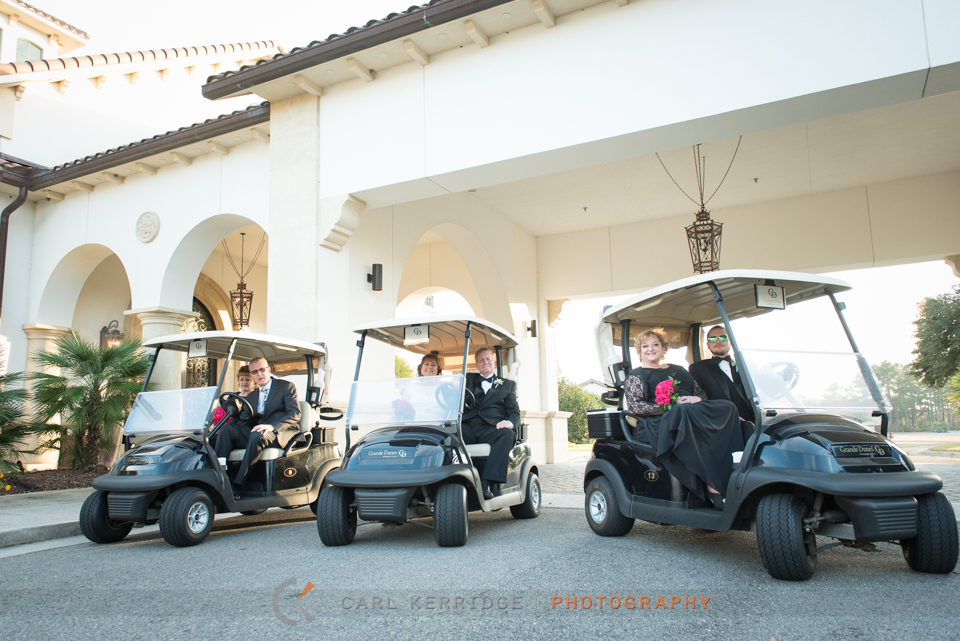 the wedding party get ready to ride off on golf carts for photos at the members club at grande dunes