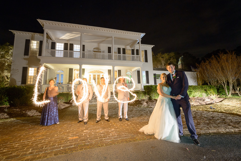 friends write love with sparklers for this Litchfield Wedding sparklers exit
